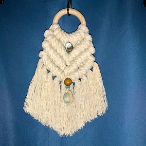 Macrame wall hanging with shell and gem accents